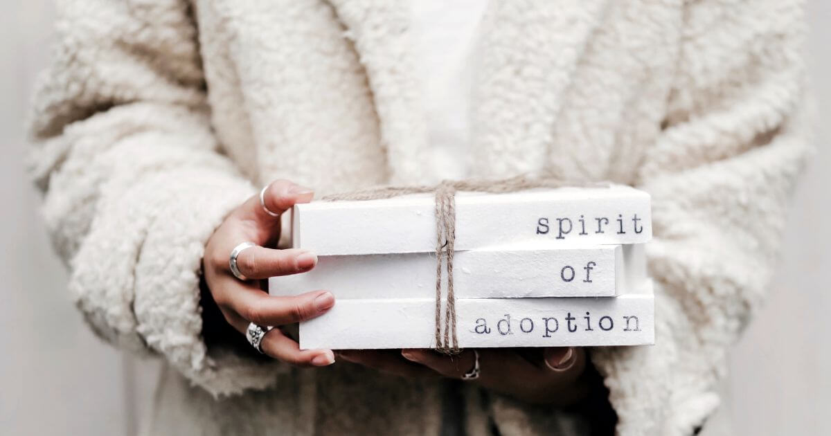 What does it mean that Christians are adopted by God?