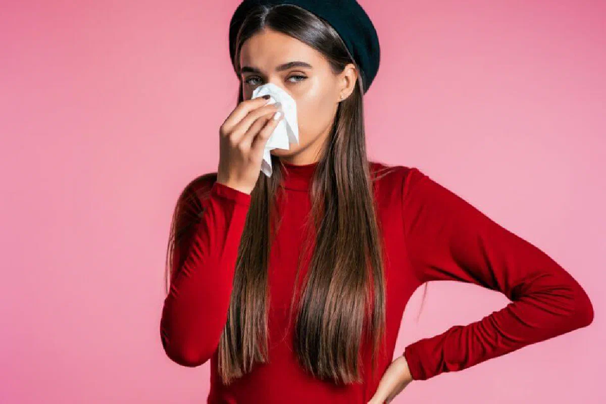 Why do we say 'God bless you' in response to a sneeze?