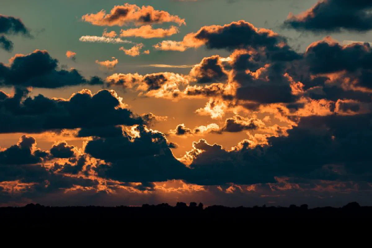Breathtaking sunset with dramatic cloud formations and vibrant colors.