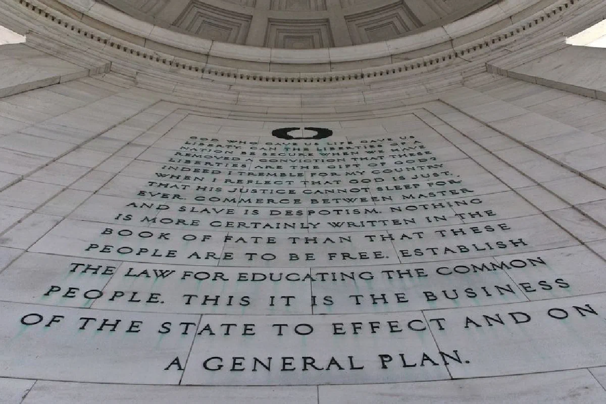 Detailed view of text inside the Thomas Jefferson Memorial, emphasizing historical significance.
