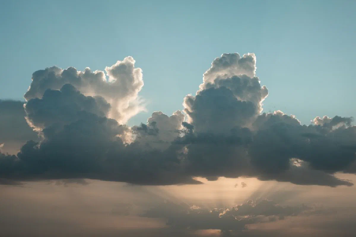 Beautiful cloudscape with sunlight rays breaking through in Corralejo, Canary Islands.