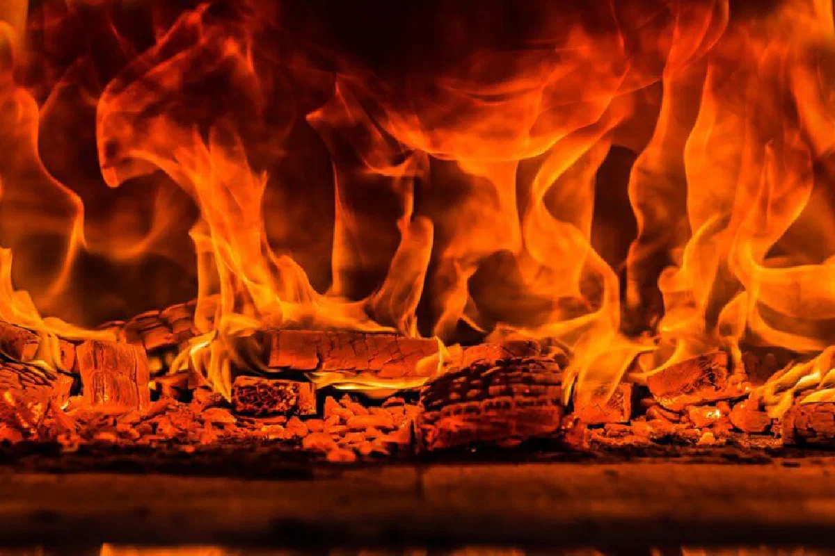 What does the Bible mean when it calls God a consuming fire?