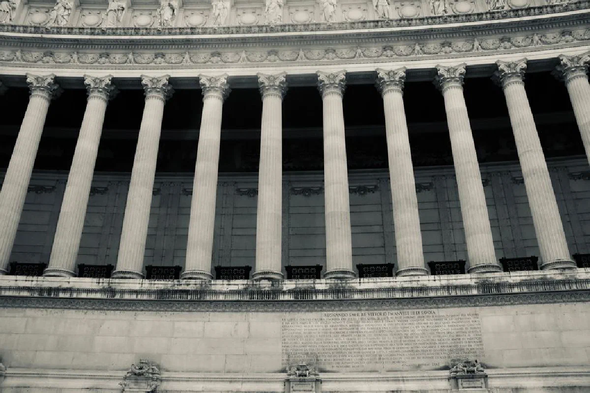 Detailed view of neoclassical columns in a government building facade.