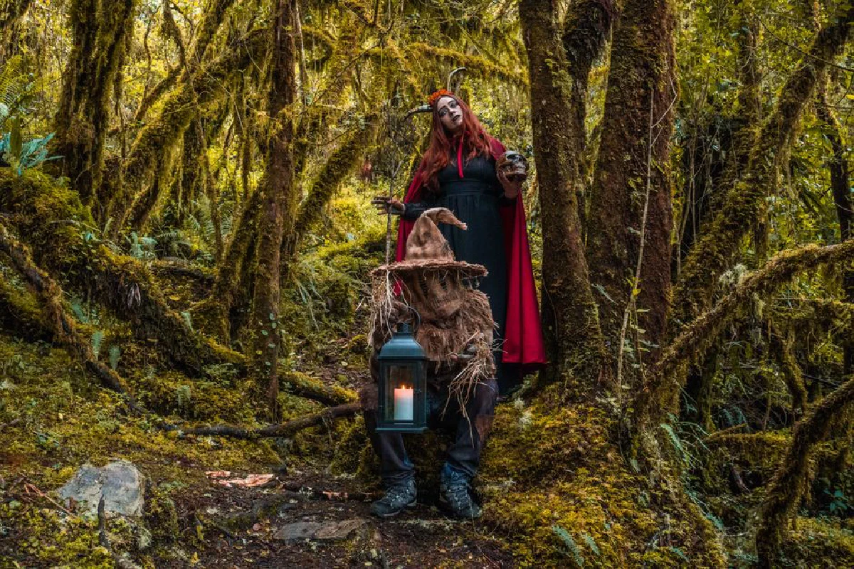 Explore spooky Halloween characters in a mossy Colombian forest setting.