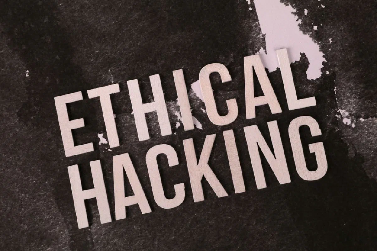Creative depiction of the term 'Ethical Hacking' on a dark artistic background.