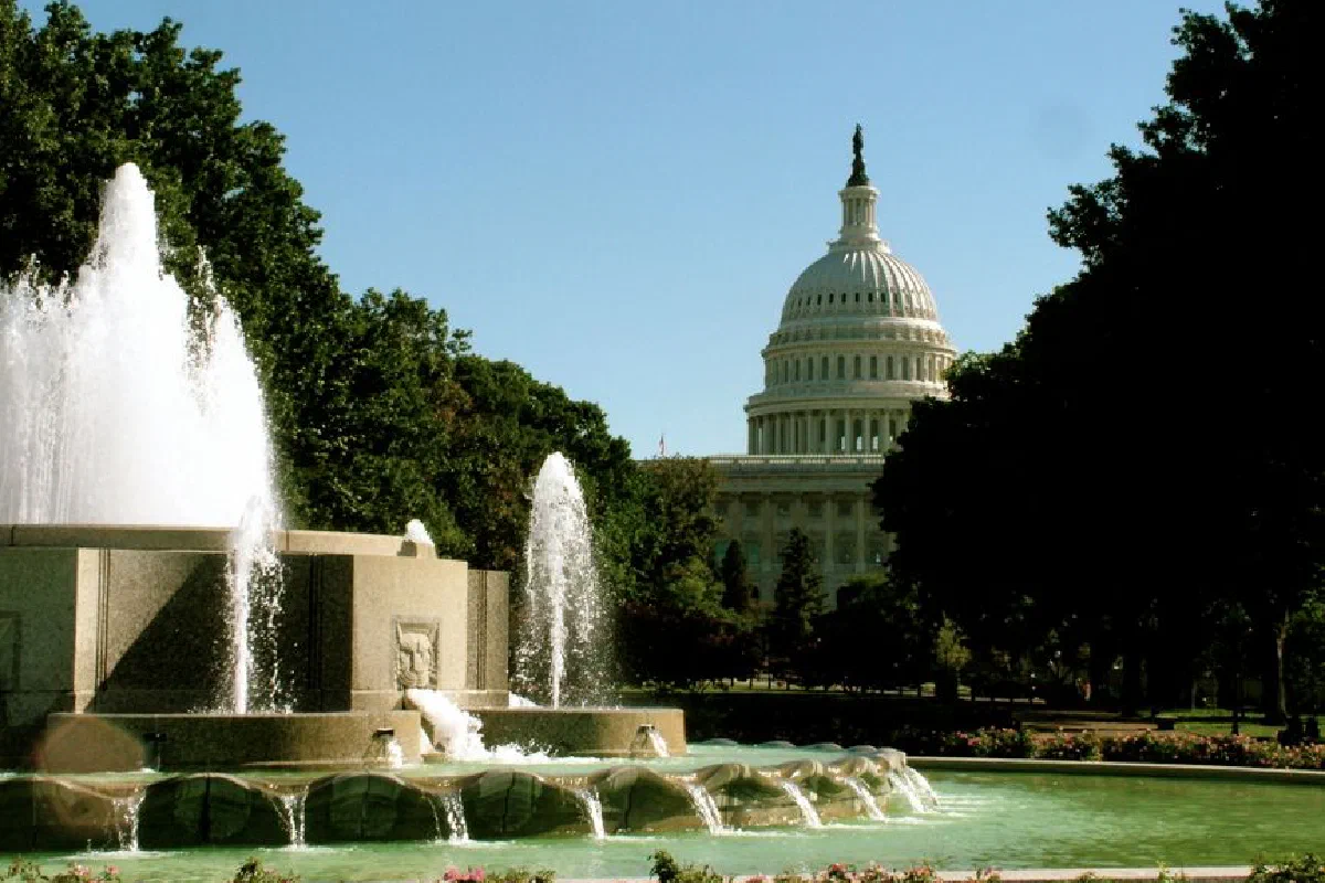 A stunning image of the US Capitol building with a foreground fountain in Washington D.C.
