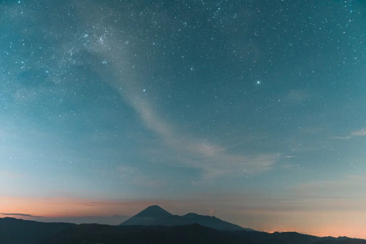 A breathtaking view of a starry sky over Mount Bromo in East Java, Indonesia.