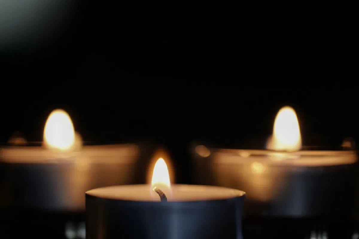 A serene close-up of tealight candles creating a cozy and warm ambiance.