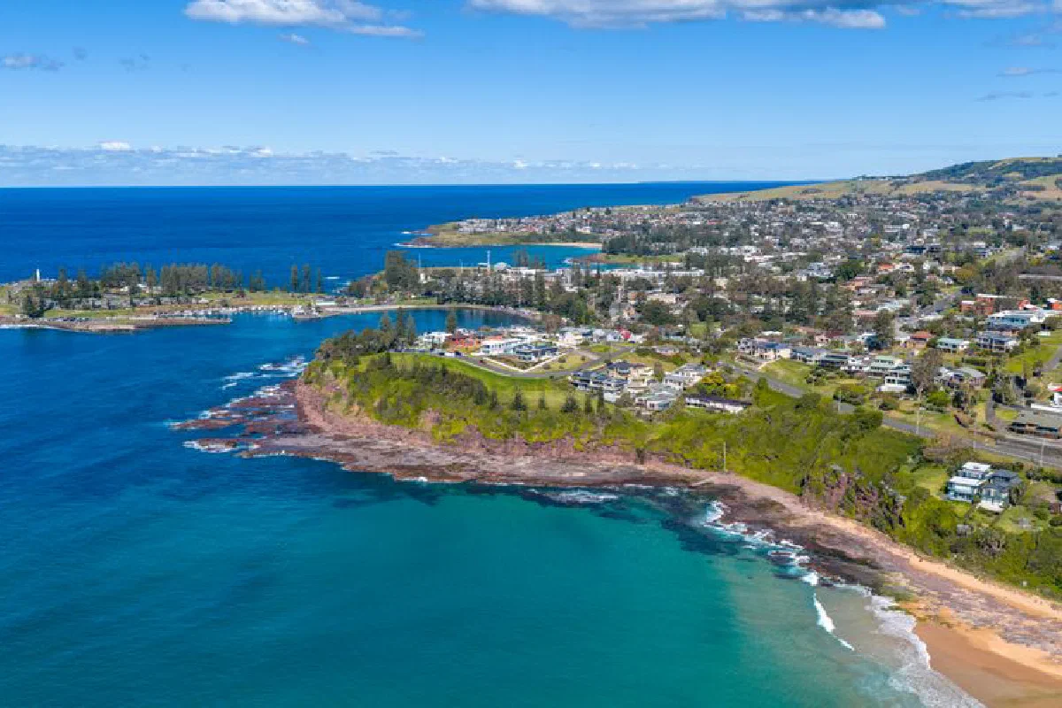 Stunning aerial view of coastline and townscape in Kiama, New South Wales, Australia, on a sunny summer day.