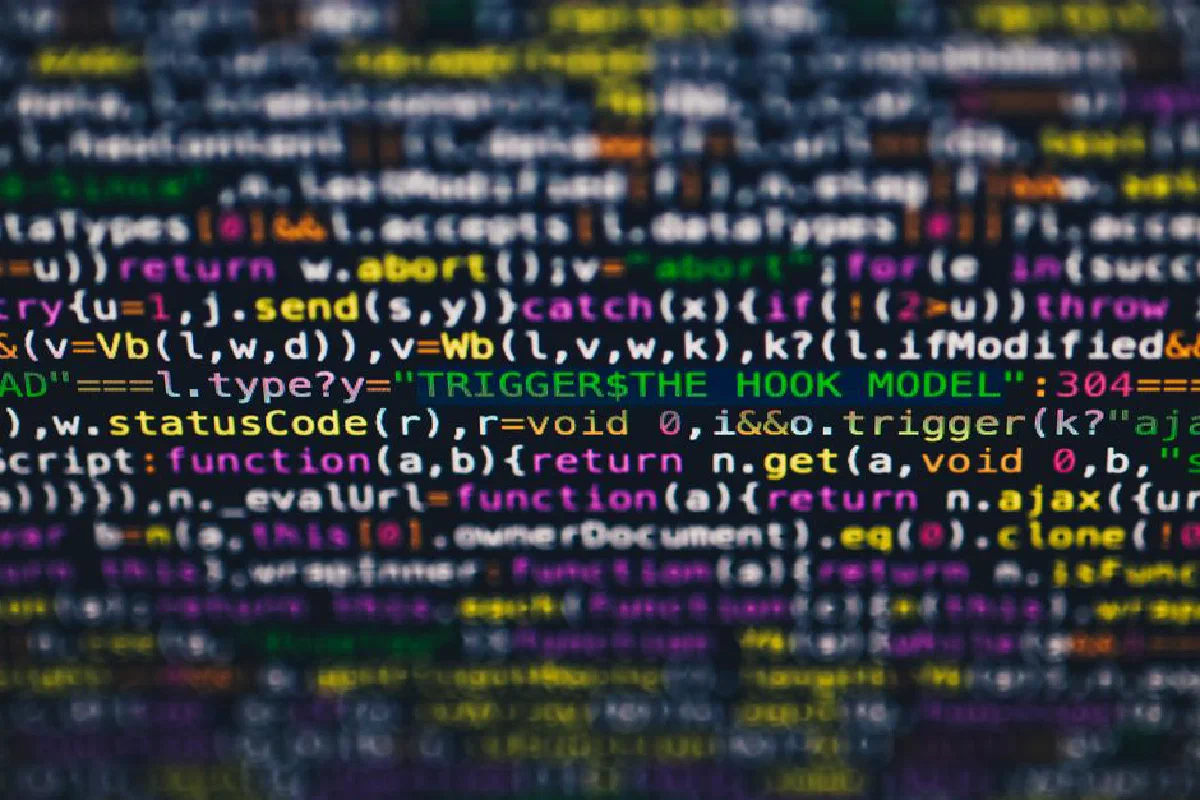 Vibrant close-up of multicolor programming code lines displayed on a screen.