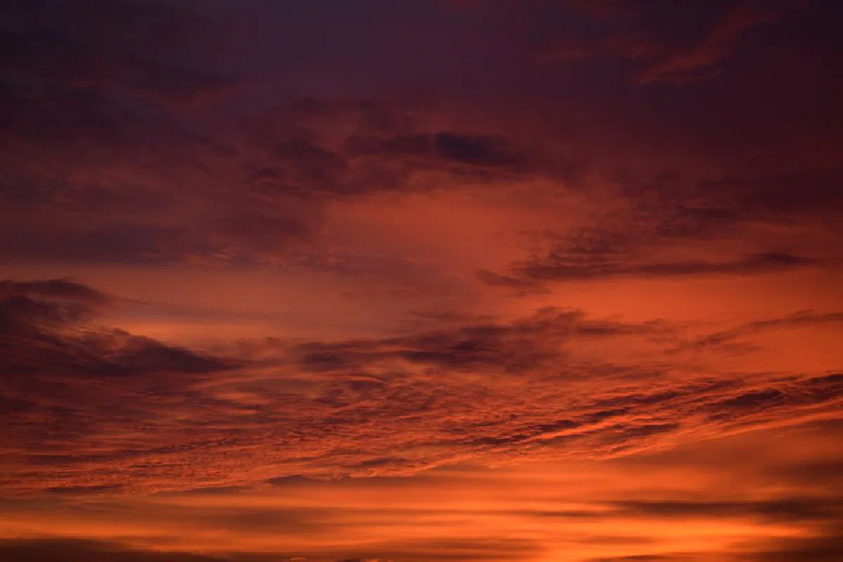 A breathtaking view of the vibrant sunset sky over Zagreb, Croatia.