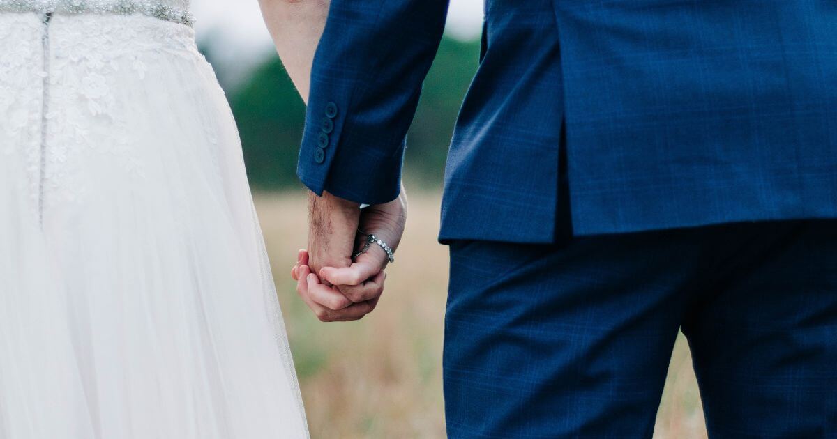 If a man is married to a divorced woman, can he serve in church leadership?