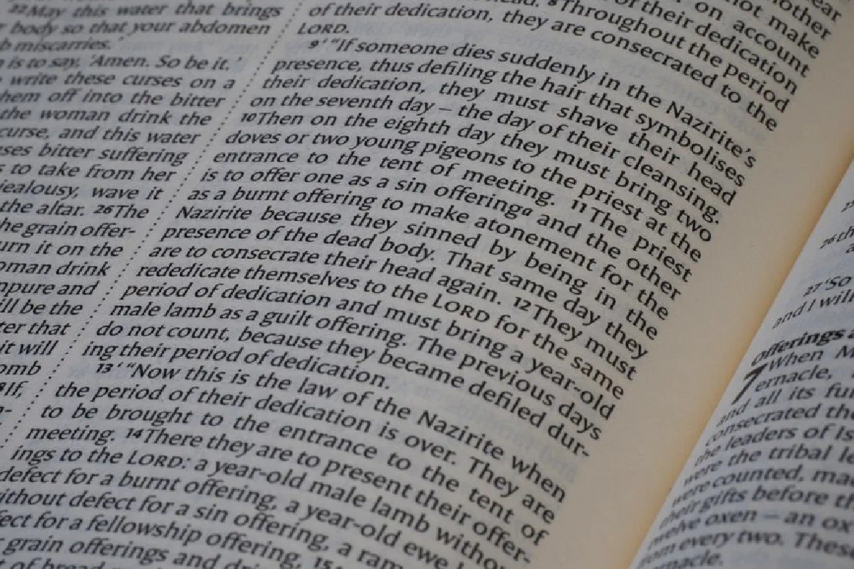 Detailed close-up of an open Bible page focusing on scripture text about Nazirites.