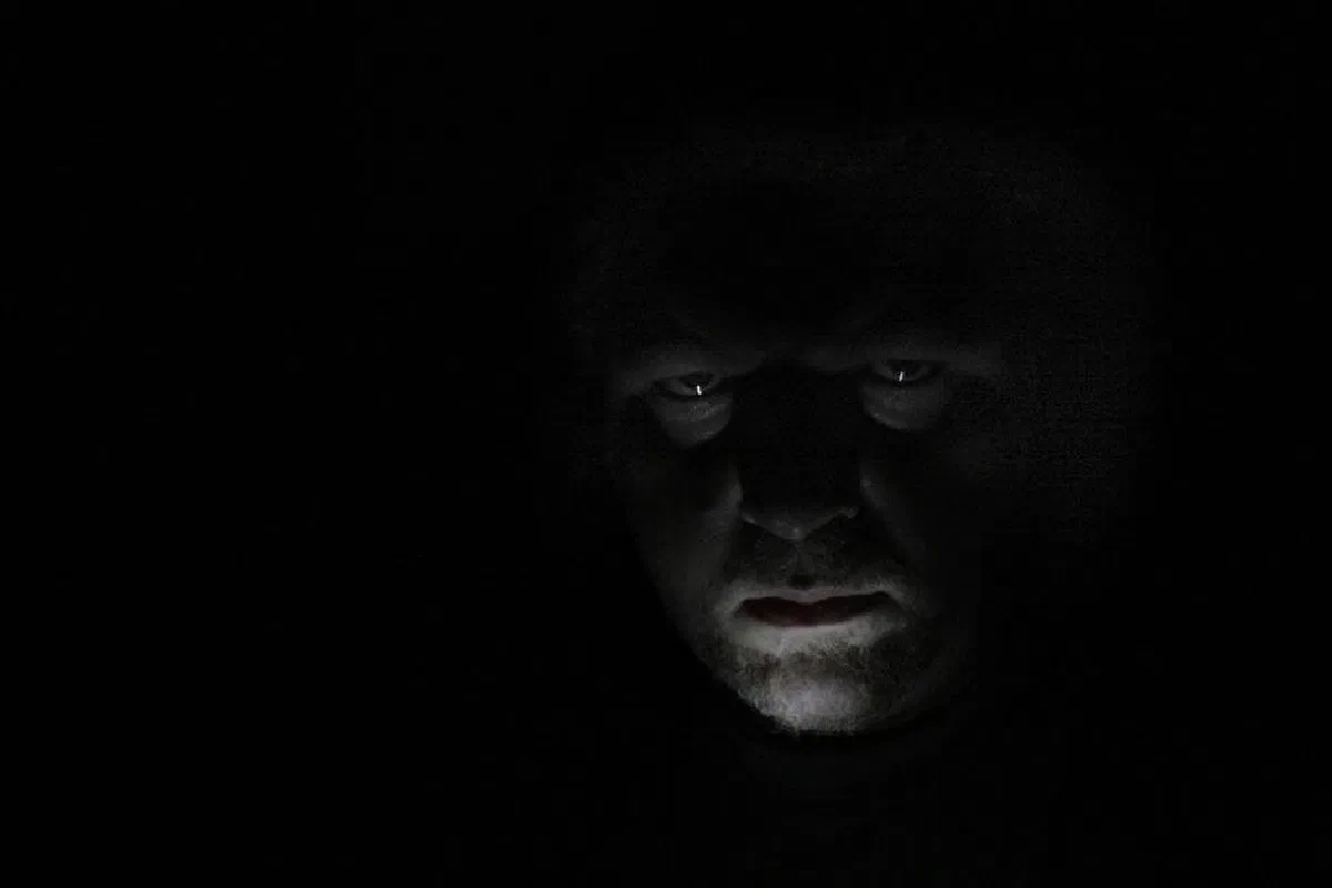 In Matthew 22:13, what does it mean to be cast into the outer darkness?