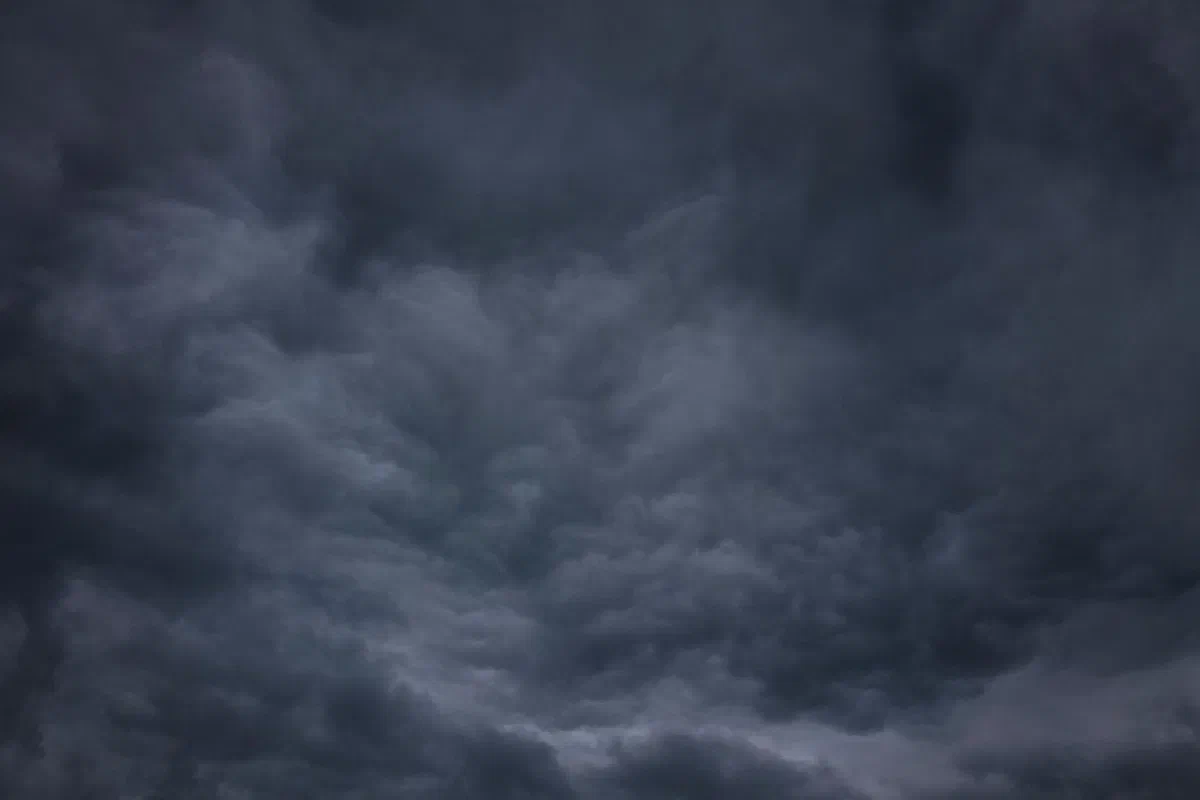 A dramatic and moody sky filled with dark storm clouds, creating a sense of impending weather change.