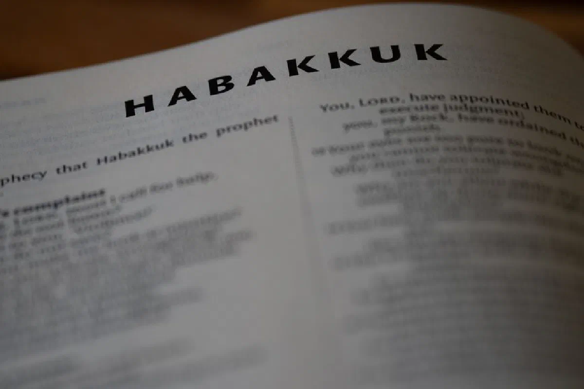 Close view of the Habakkuk page in the Bible, focusing on text details.