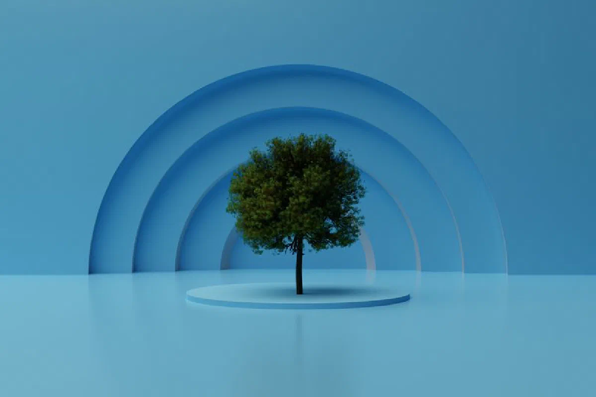 A lone tree stands in a minimalist, artistic blue environment with arch designs.