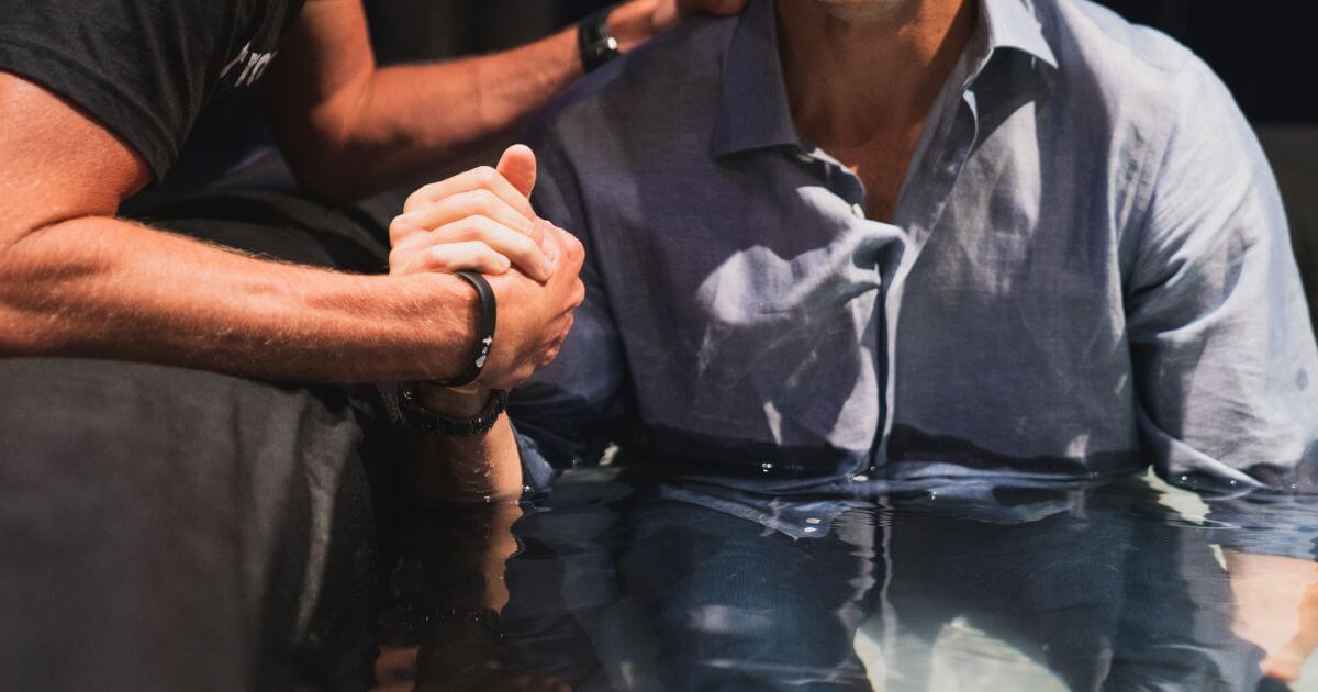 What does water baptism symbolize?