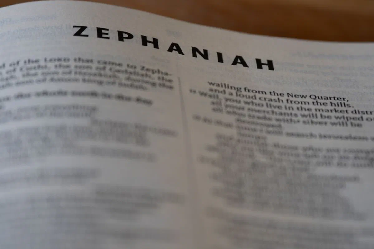 Detailed close-up page of Zephaniah book in the Bible highlighting text.