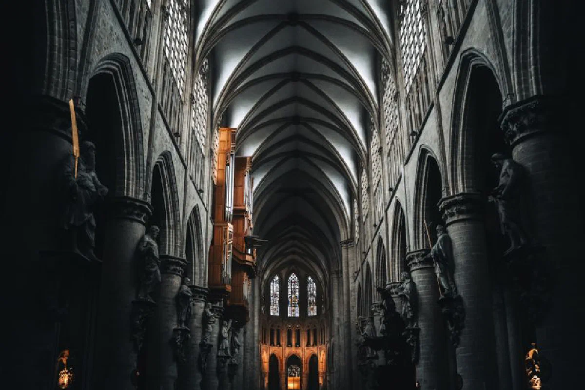 Interior view of the stunning Gothic architecture inside Brussels Cathedral, Belgium.