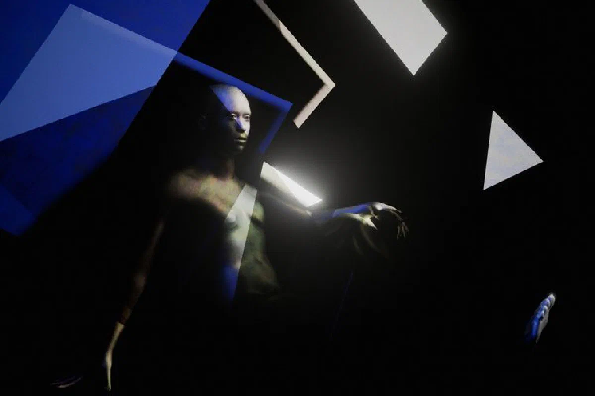 Modern art piece featuring geometric shapes and male model in dim lighting.