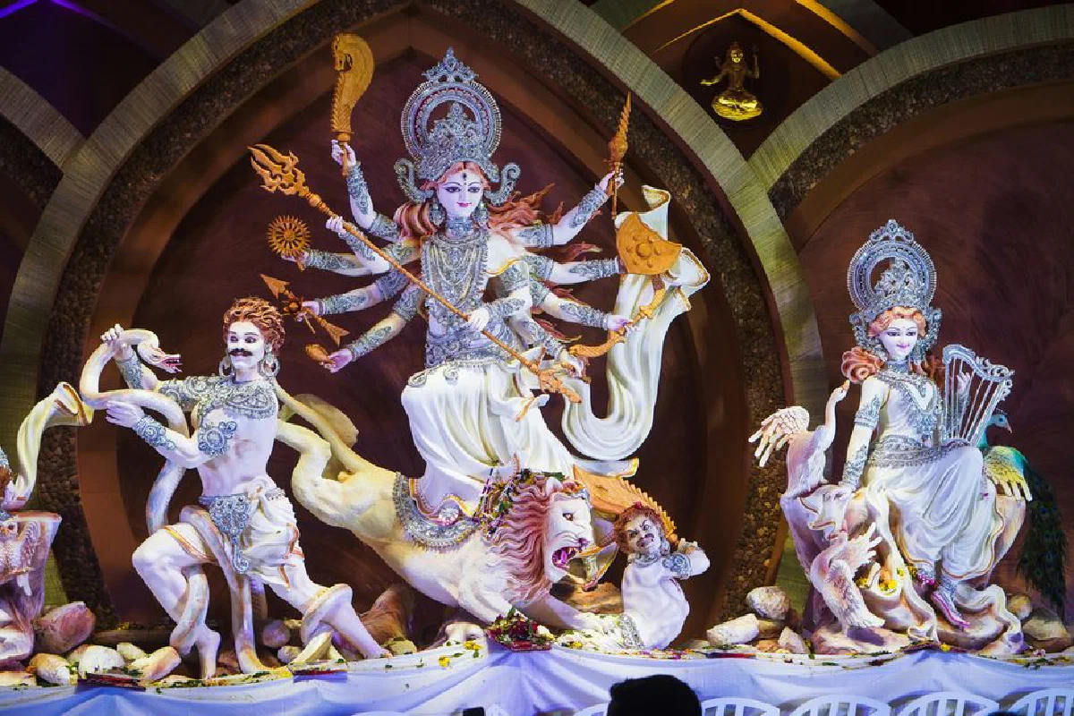 Vibrant depiction of Goddess Durga during Durga Puja festival celebration.