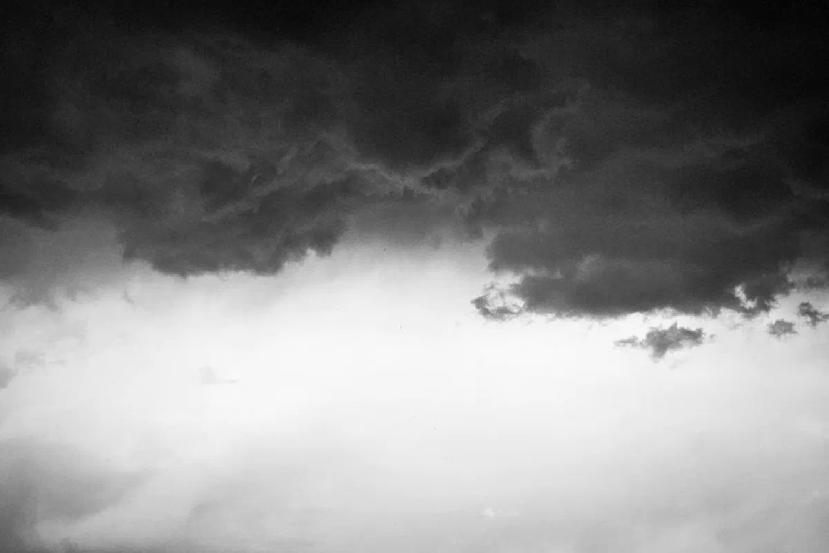 Moody black and white image of storm clouds, creating a dramatic sky over Türkiye.