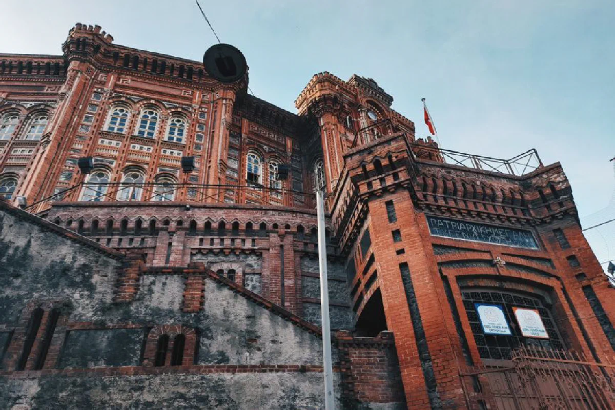 Majestic red brick architecture of Fener Greek Orthodox College in Istanbul.