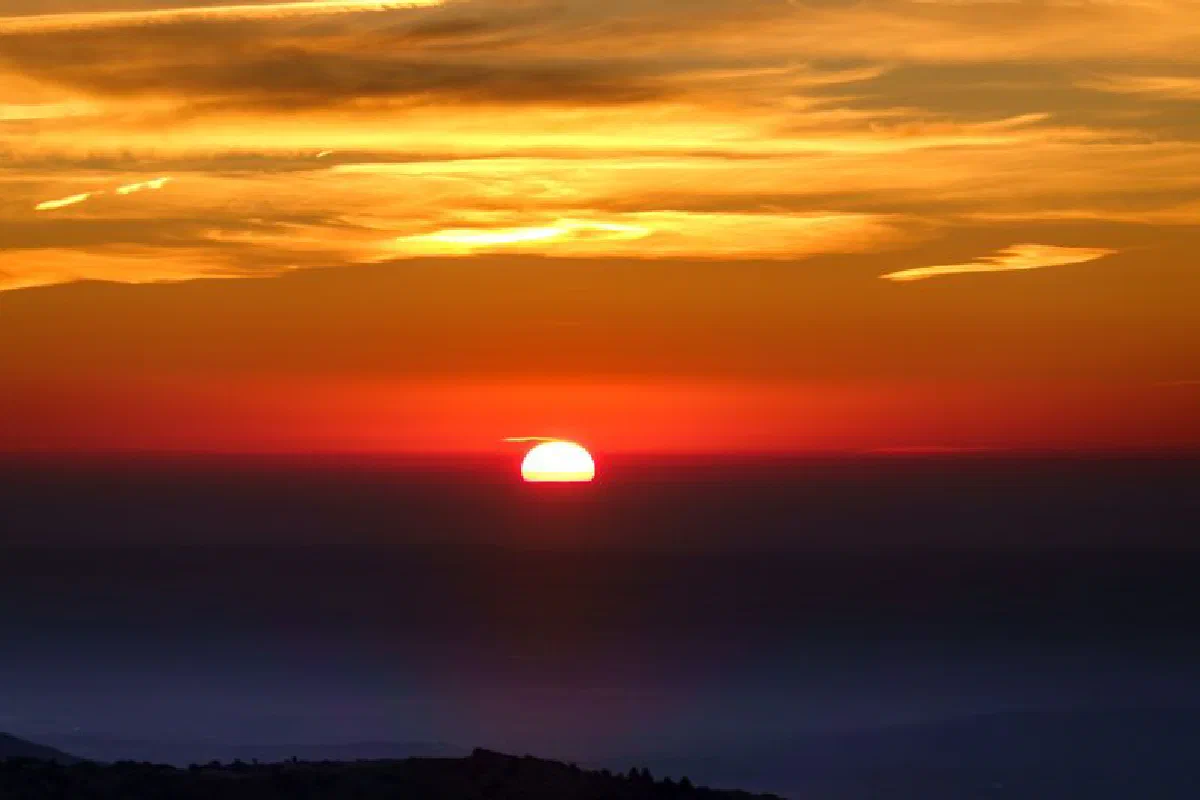 A captivating sunrise with dramatic sky colors at dawn.