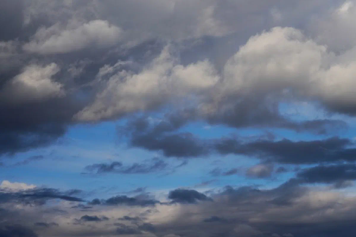 Beautiful dramatic cloud formation with stormy weather and patches of blue sky.