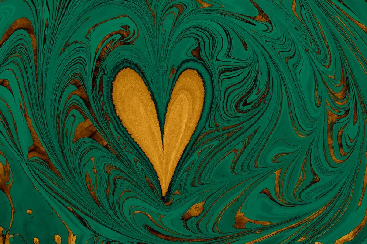 Abstract art featuring a heart shape with a vibrant marbling pattern in green and brown.
