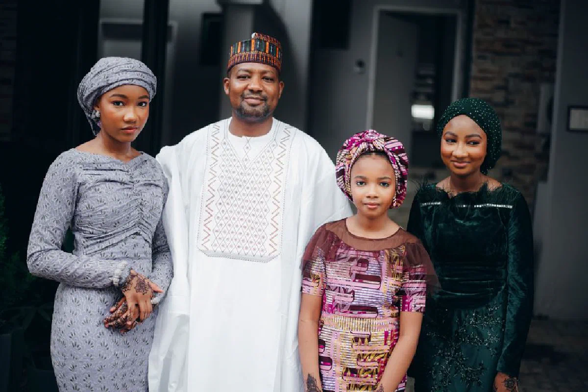 Elegant family portrait showcasing traditional African outfits and cultural heritage.