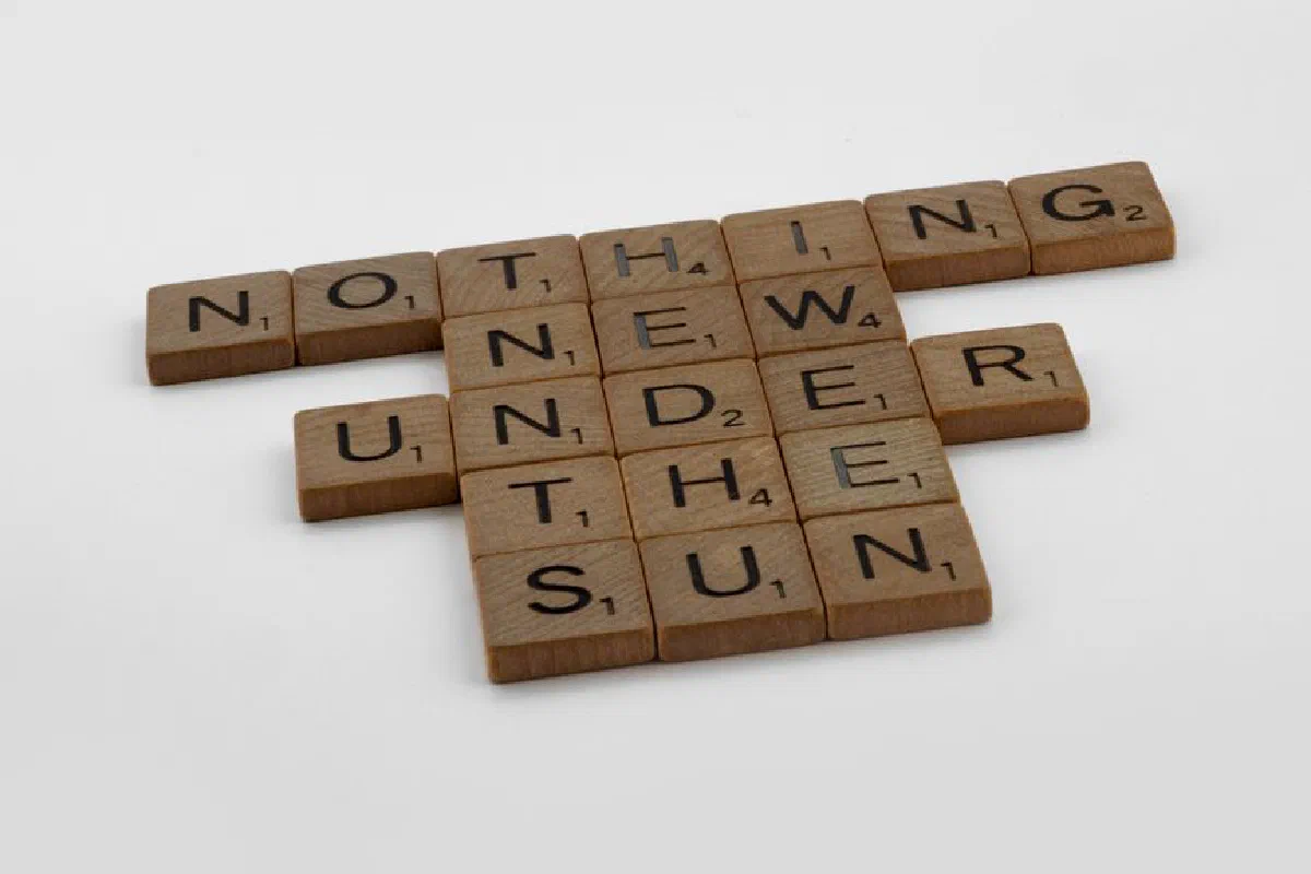 Scrabble tiles arranged to display the phrase 'Nothing Under the Sun' on a white background.