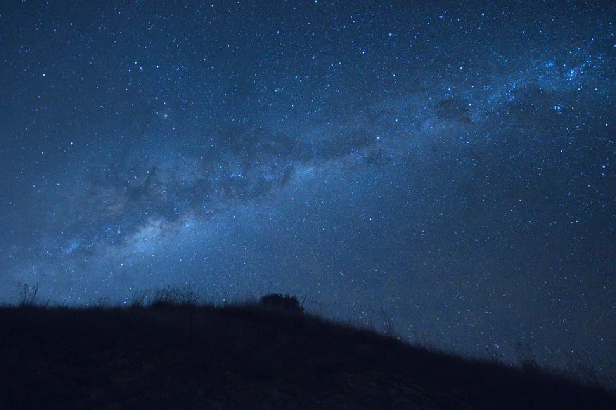 Stunning view of the Milky Way stretching across a clear night sky in New Zealand.