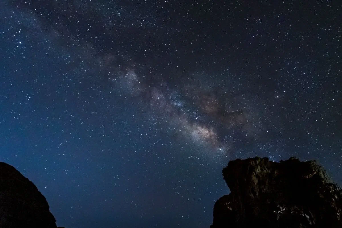 Dazzling Milky Way galaxy captured over the remote desert landscape in Tamanrasset, Algeria.