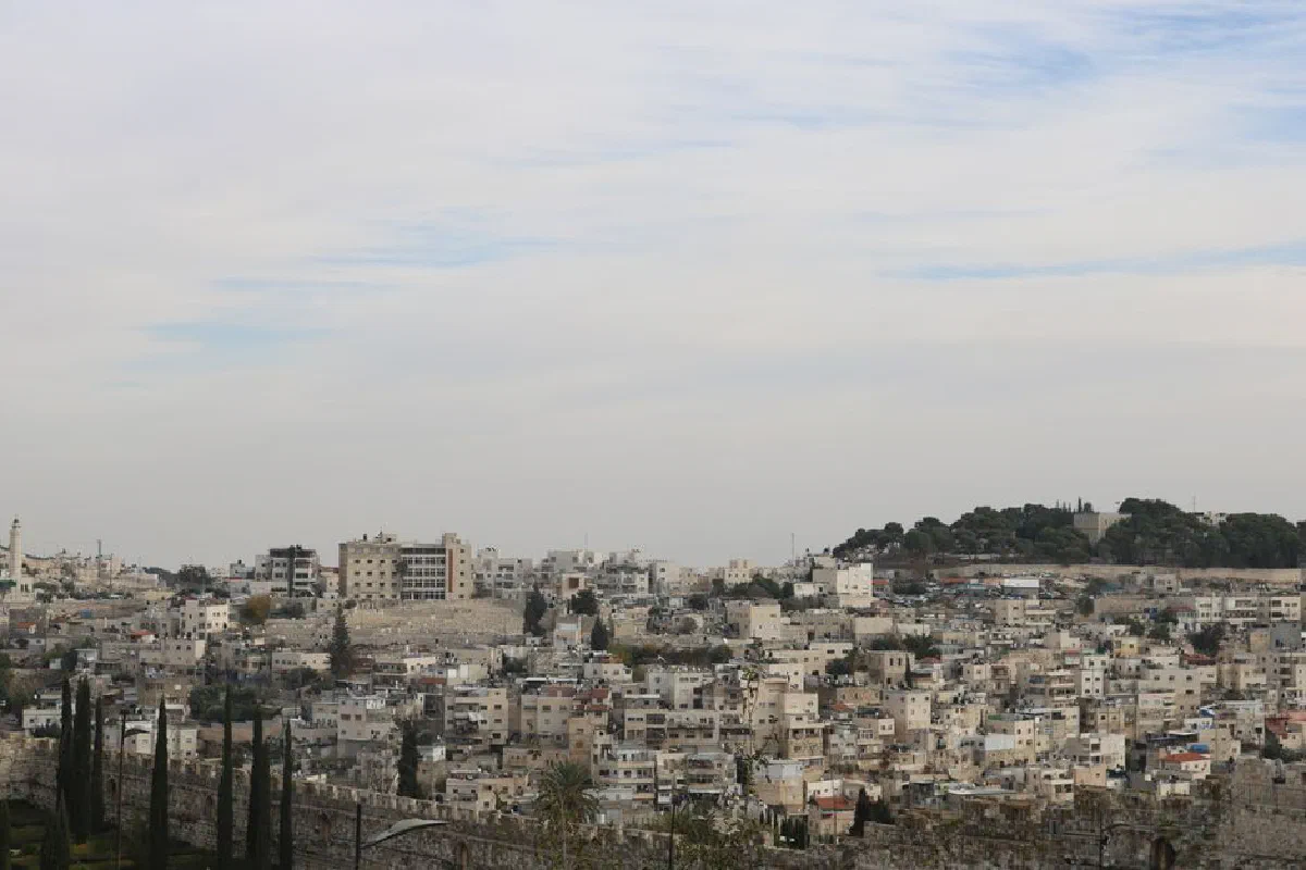Aerial view of the historical architecture of Jerusalem, showcasing old city buildings and skyline.
