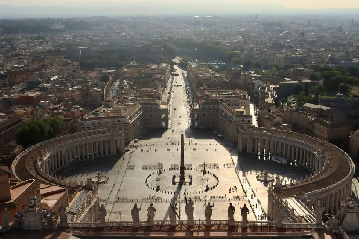 Aerial view of the iconic St. Peter's Square in Vatican City with architectural beauty and historical significance.