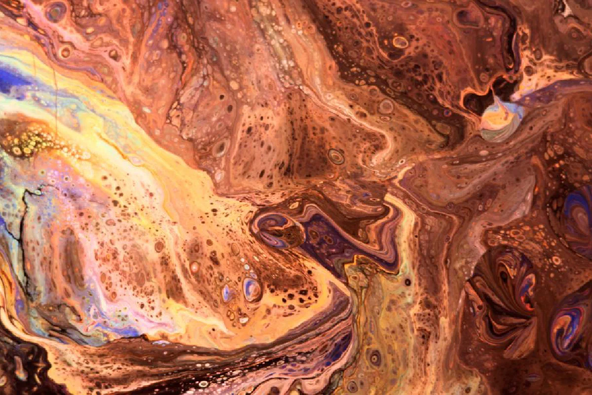 Vibrant abstract painting with swirling colors and earthy tones.