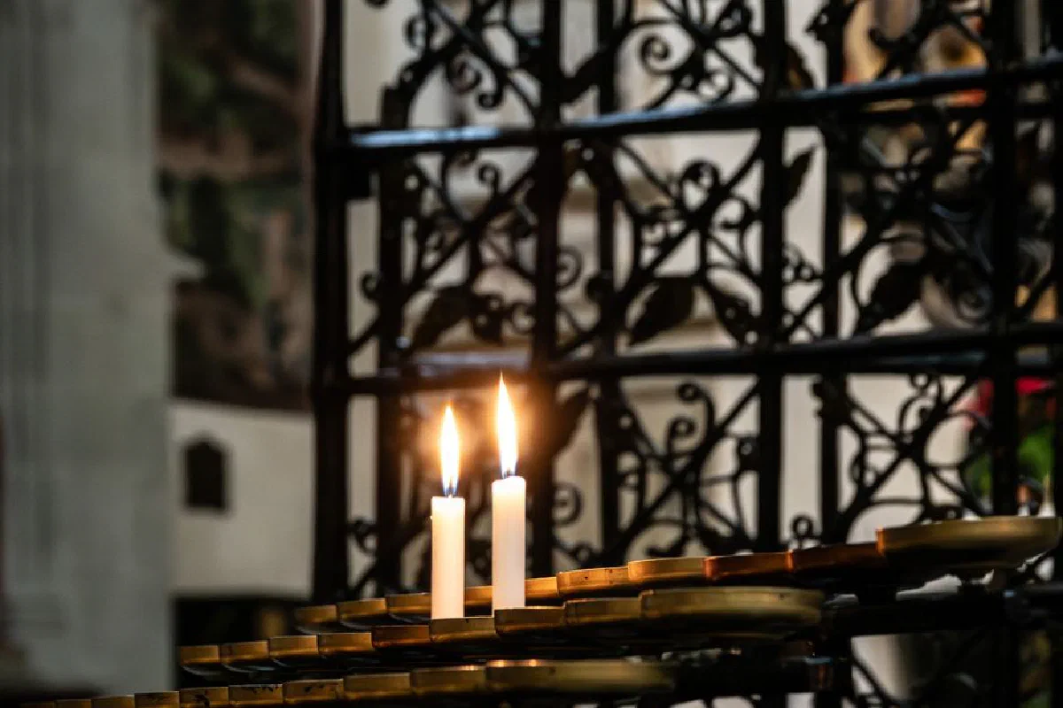 Serene view of candles on a church altar in Konstanz, Germany.