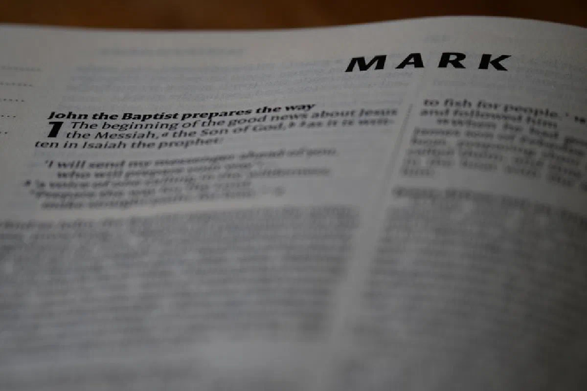 Close-up of the Gospel of Mark in the Bible with selective focus on text.