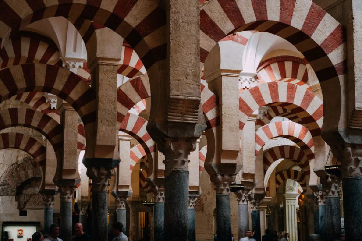 Explore the mesmerizing arches and intricate architecture of the Great Mosque of Córdoba.