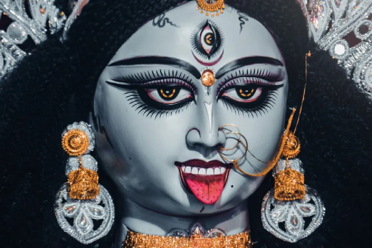 Intricate close-up of the Hindu Goddess Kali idol, featuring detailed ornamentation in Kolkata.