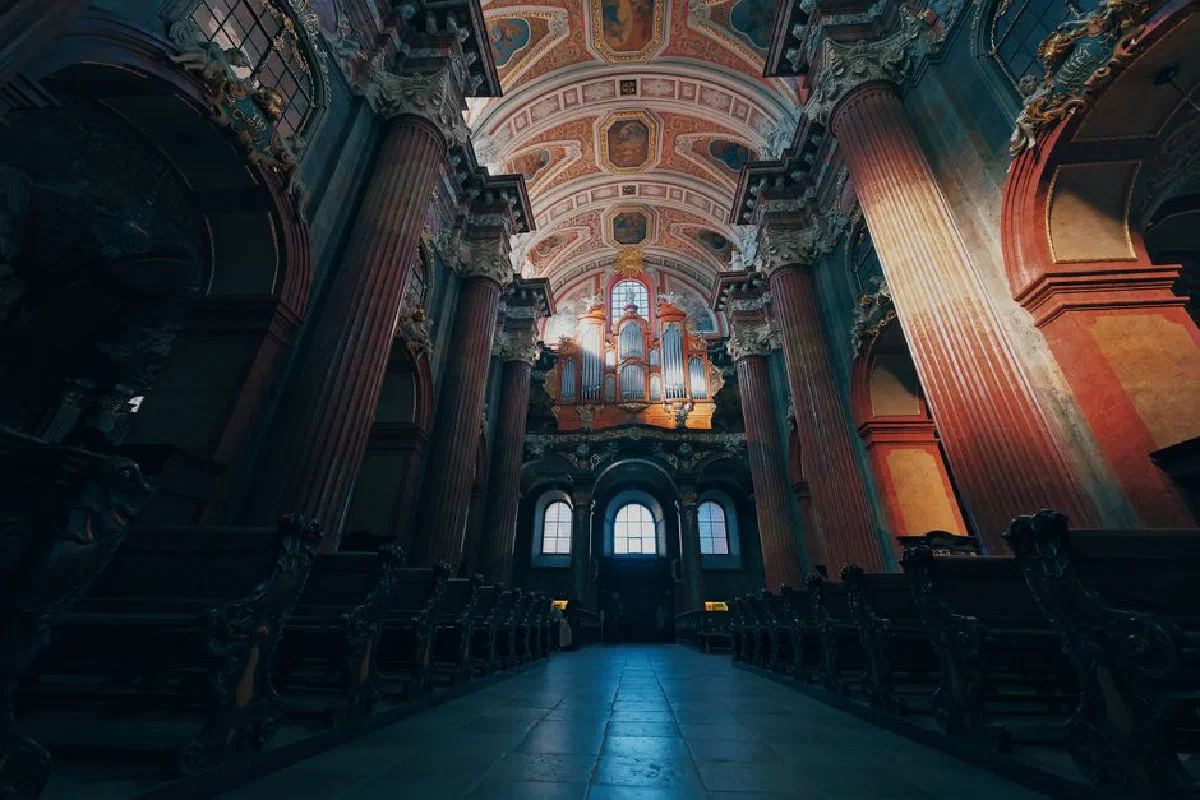 Captivating architectural design of a cathedral in Poznań, Poland. Majestic columns and intricate details.