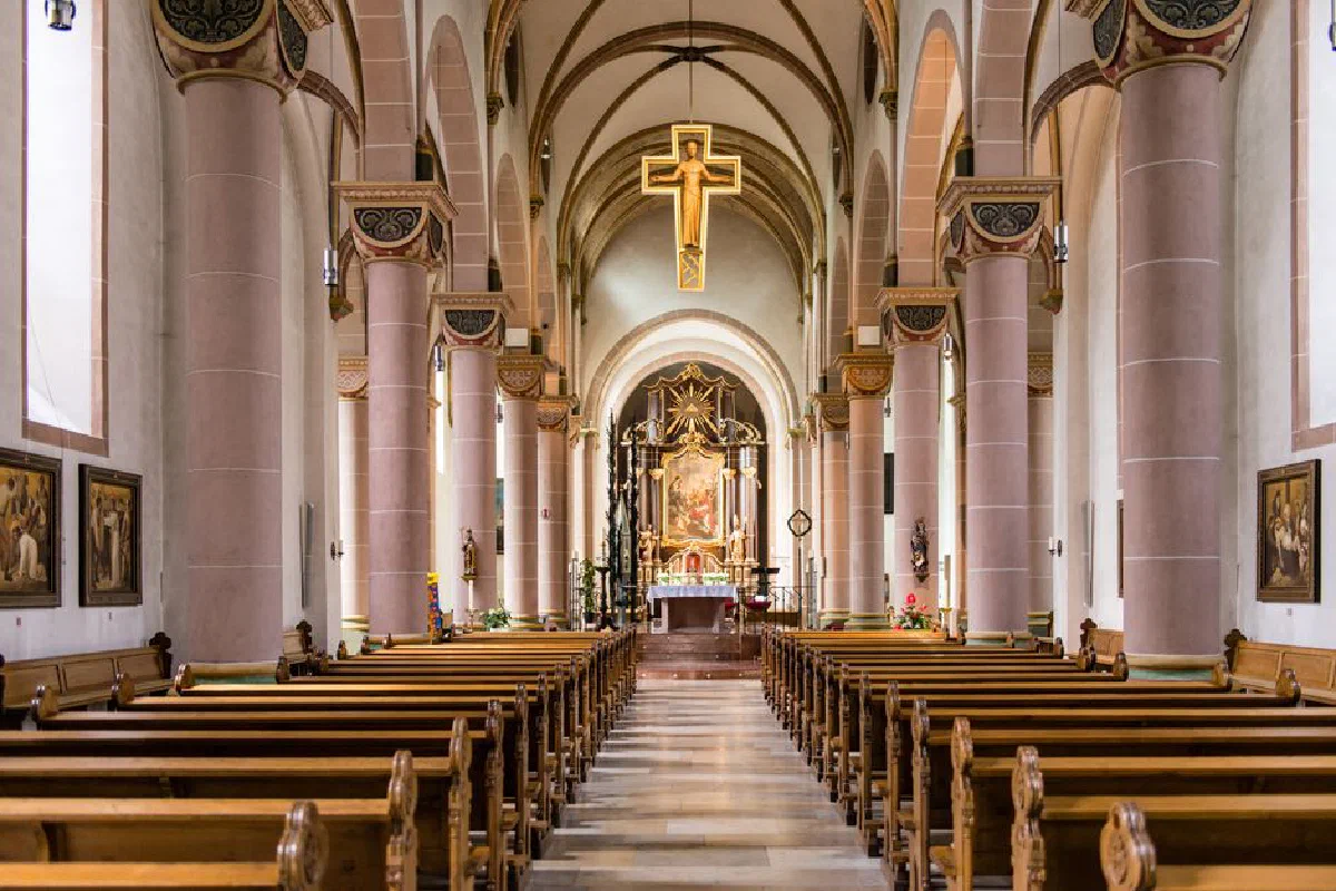 Wide interior view of a stunning empty Catholic church in Höxter, Germany.
