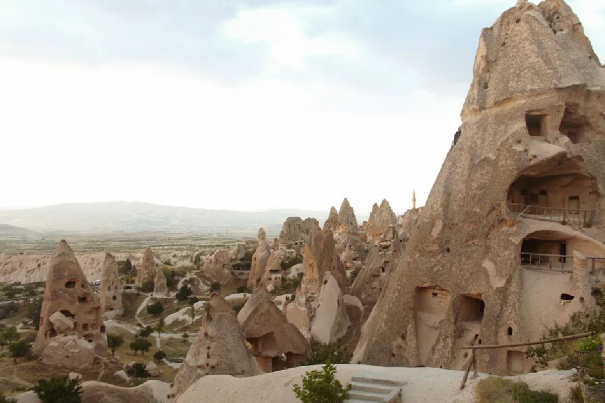 Discover the unique rock formations of Cappadocia, Turkey, shaped by erosion.