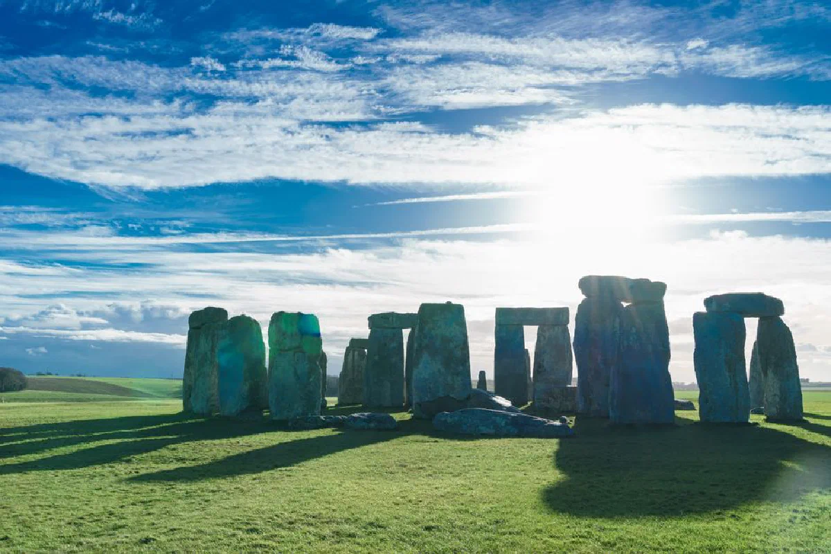 A stunning view of Stonehenge in Salisbury, England during sunrise, showcasing its historic charm.