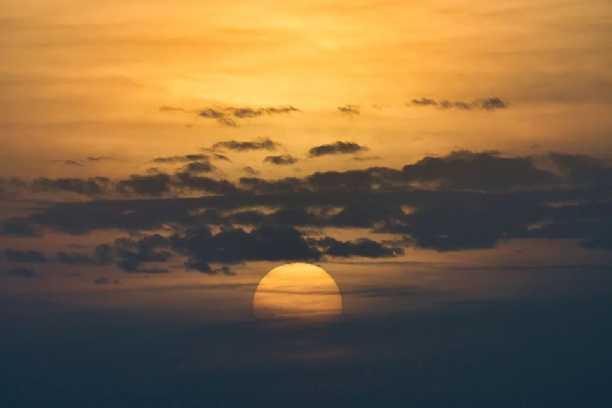 Captivating sunset over Poprad, Slovakia with clouds creating a dramatic silhouette effect.