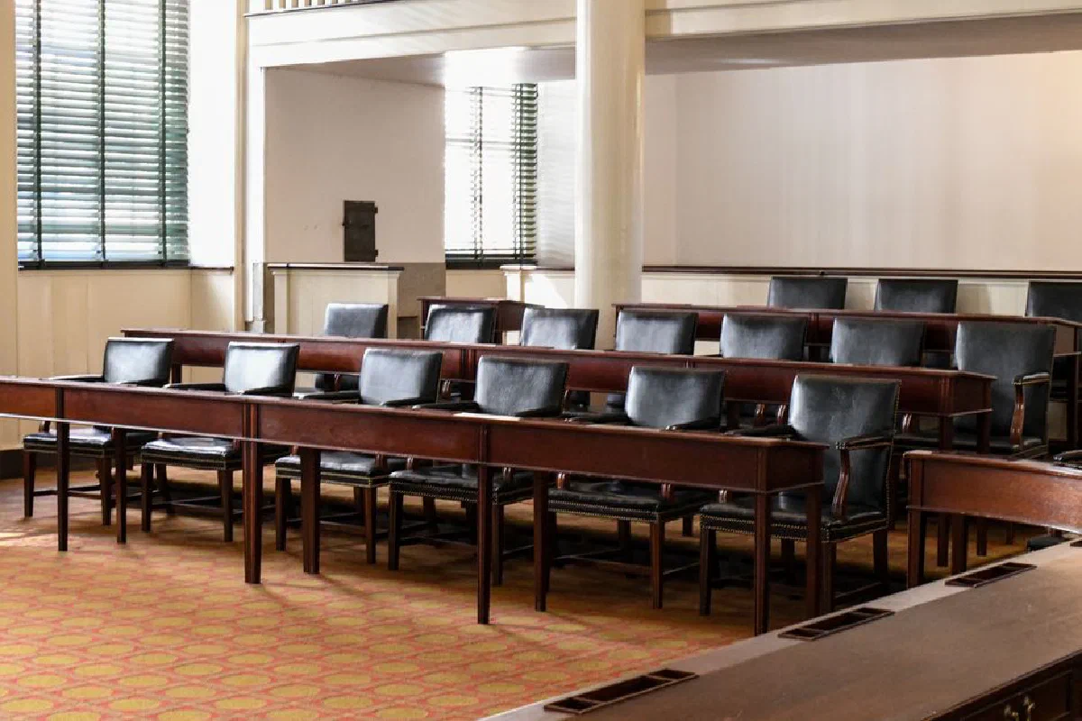 Empty Congress Hall chamber with classic wooden seating in Philadelphia's historic landmark.
