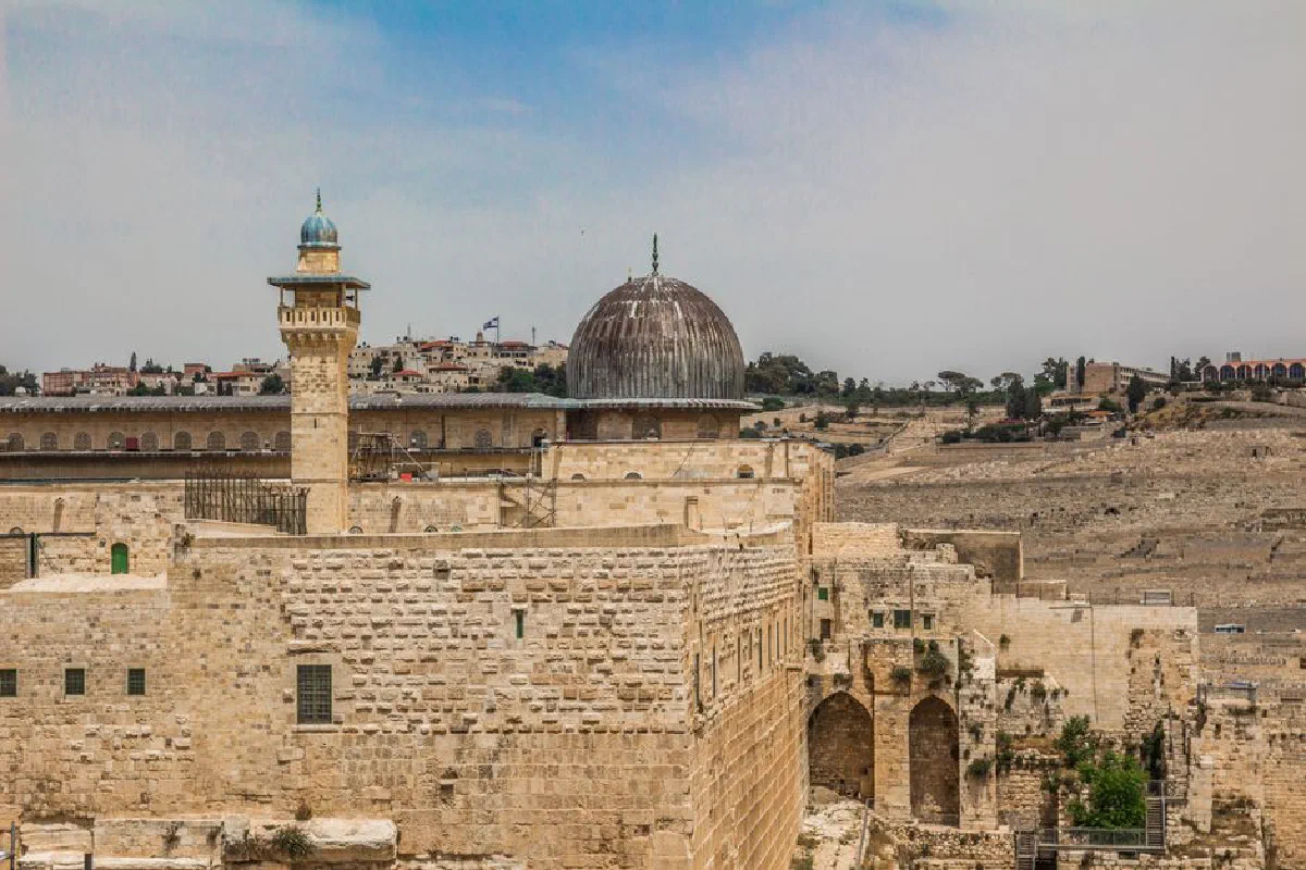 View of the ancient Al-Aqsa Mosque in Jerusalem, showcasing its Islamic architecture and historical significance.