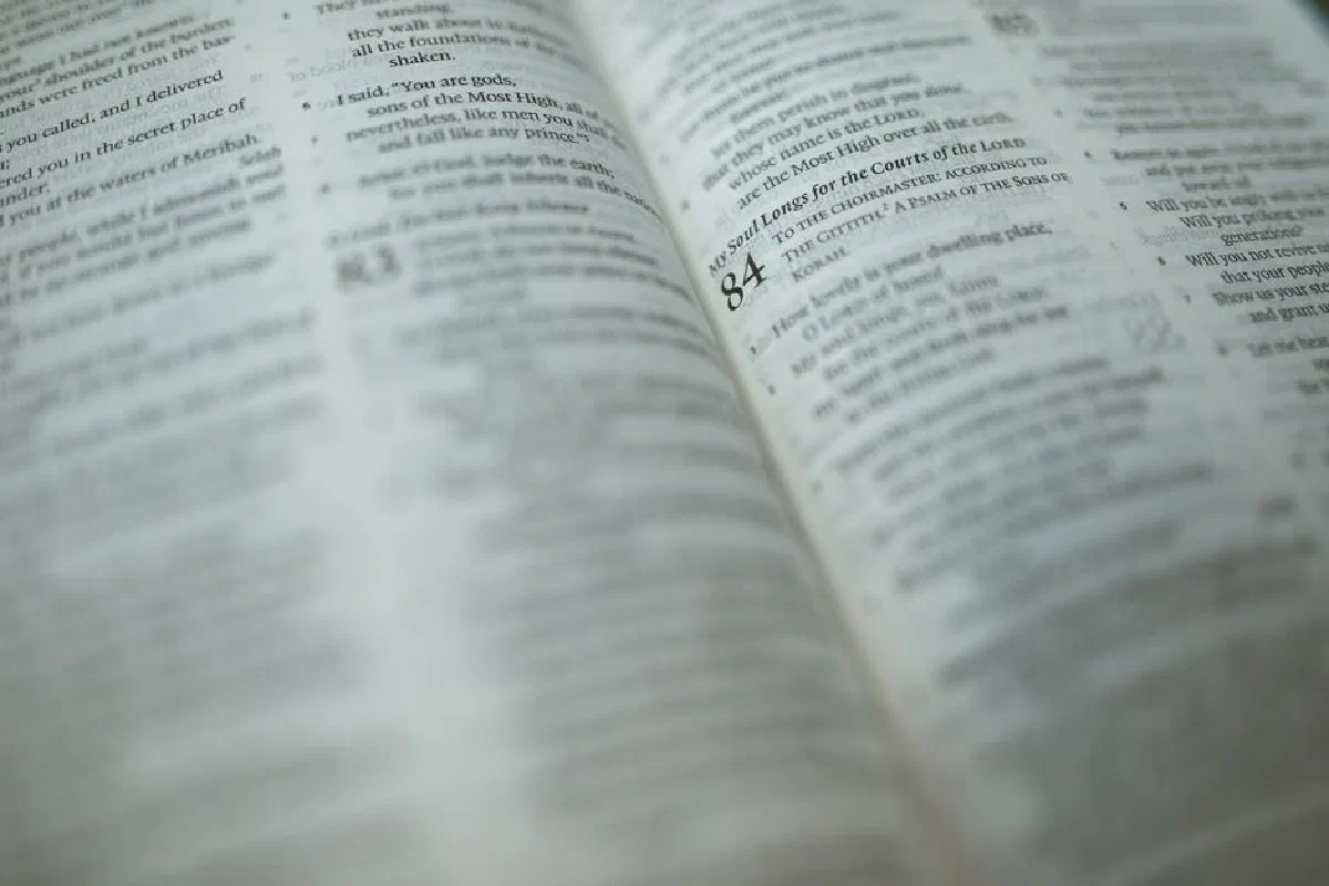 A detailed close-up of a Bible page with a highlighted Psalm, symbolizing faith and spirituality.